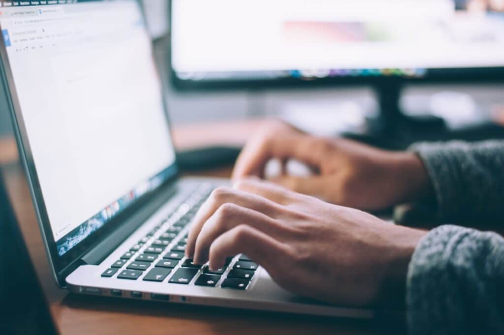 Email Marketing 5 Typing At A Computer